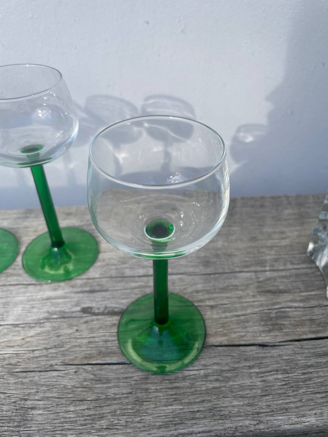 7 green glass stemmed glasses
