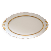 Oval dish. Limoges Montambert art porcelain. White matt gold rim;