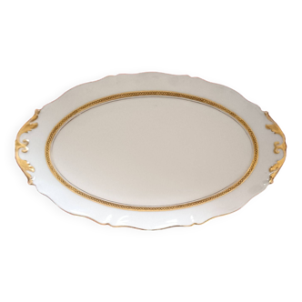 Oval dish. Limoges Montambert art porcelain. White matt gold rim;