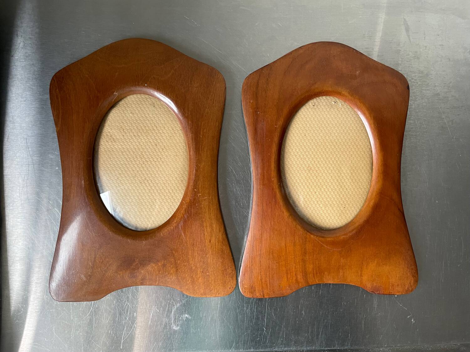 Pair of antique  identical art deco mahogany wooden frames measurements each  25 cm x 17.5 cm  convex glasses