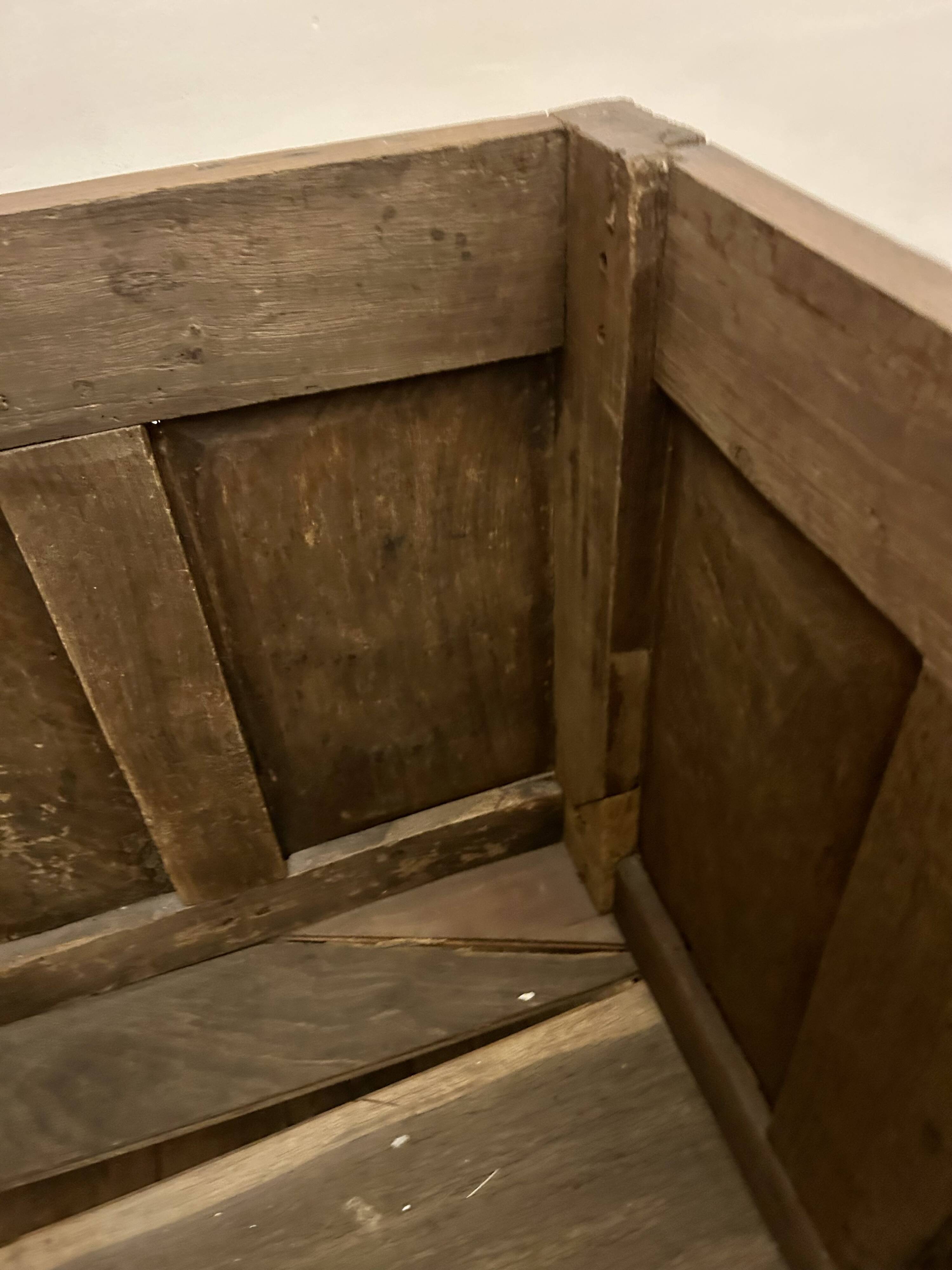 Large antique chest in weathered solid wood