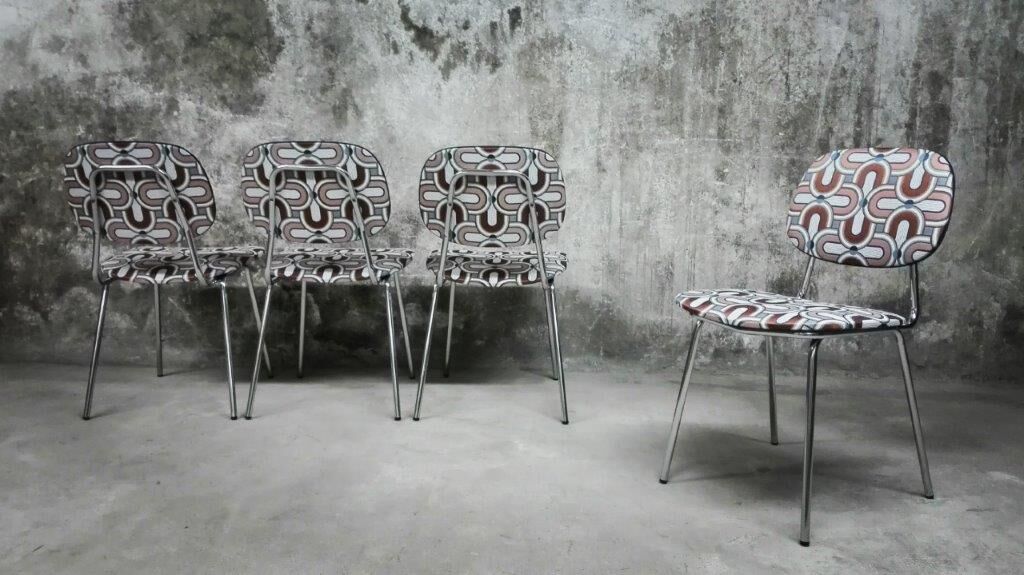 Series of four vintage italian chairs in chrome steel