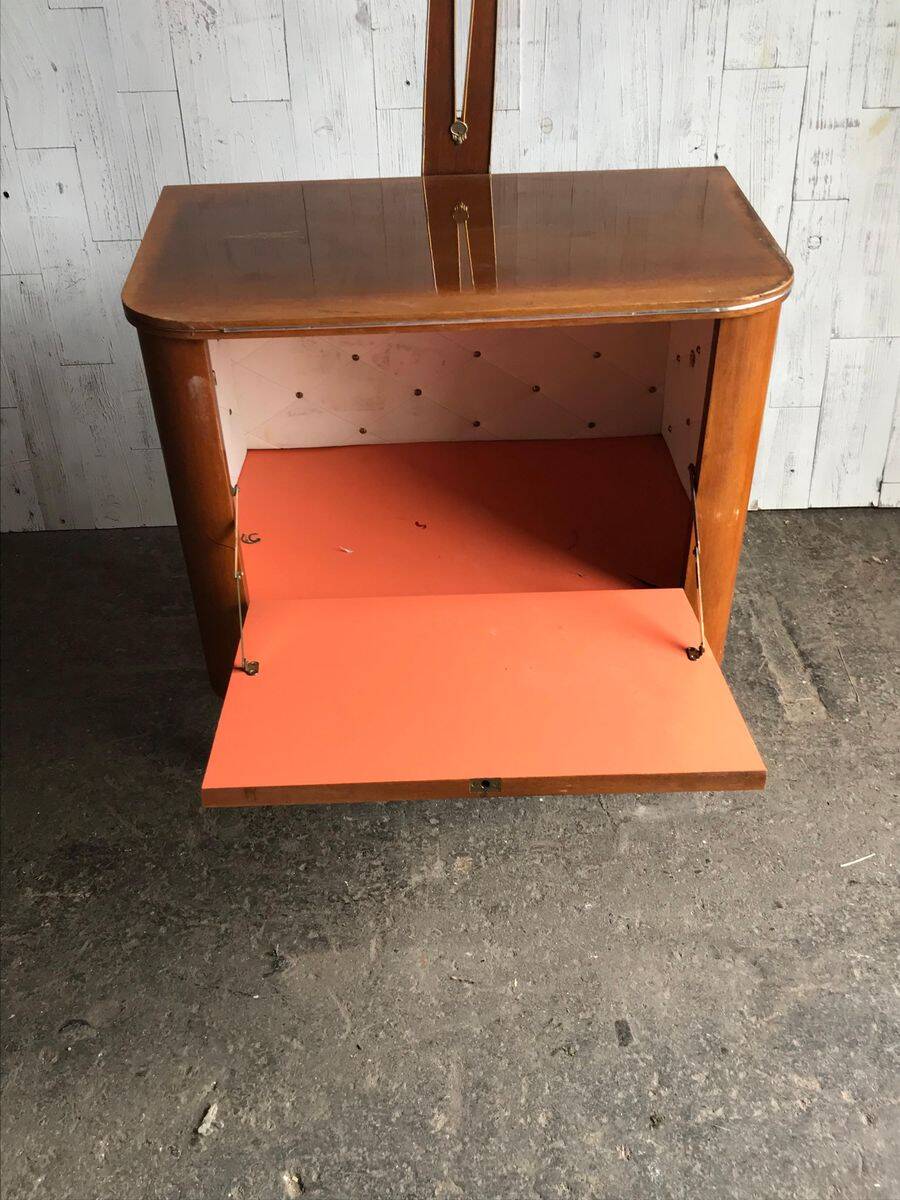 Art Deco bar cabinet in brown walnut with integrated lamp and three sockets, 1950s.