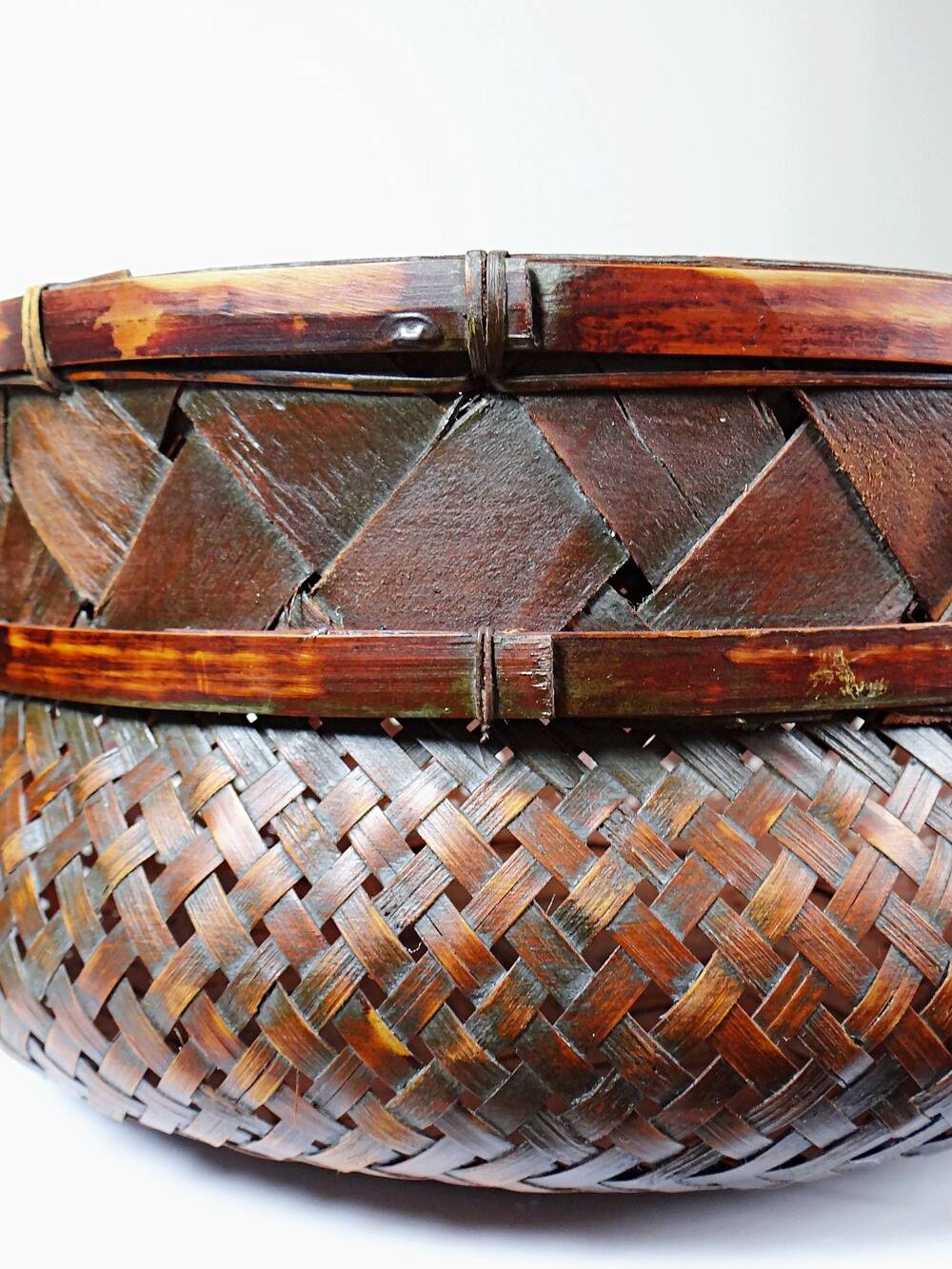 Pair of vintage nesting handmade Japanese woven bamboo baskets