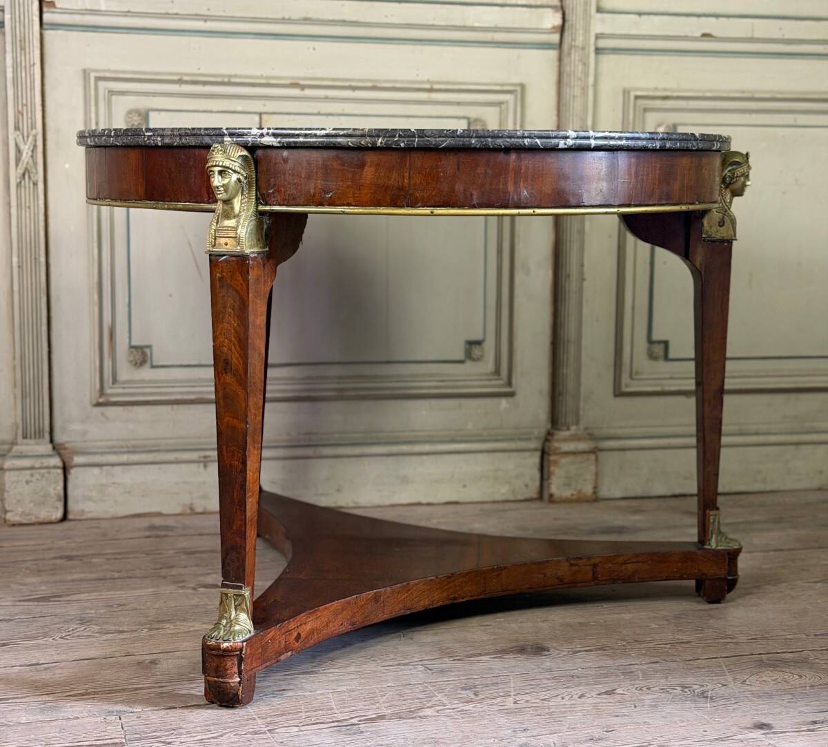 Empire pedestal table in mahogany and bronze, Saint-Anne grey marble with groove, circa 1800
