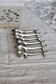 6 vintage dachshund knife rests – Patinated silver metal