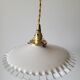 Serrated opaline suspension