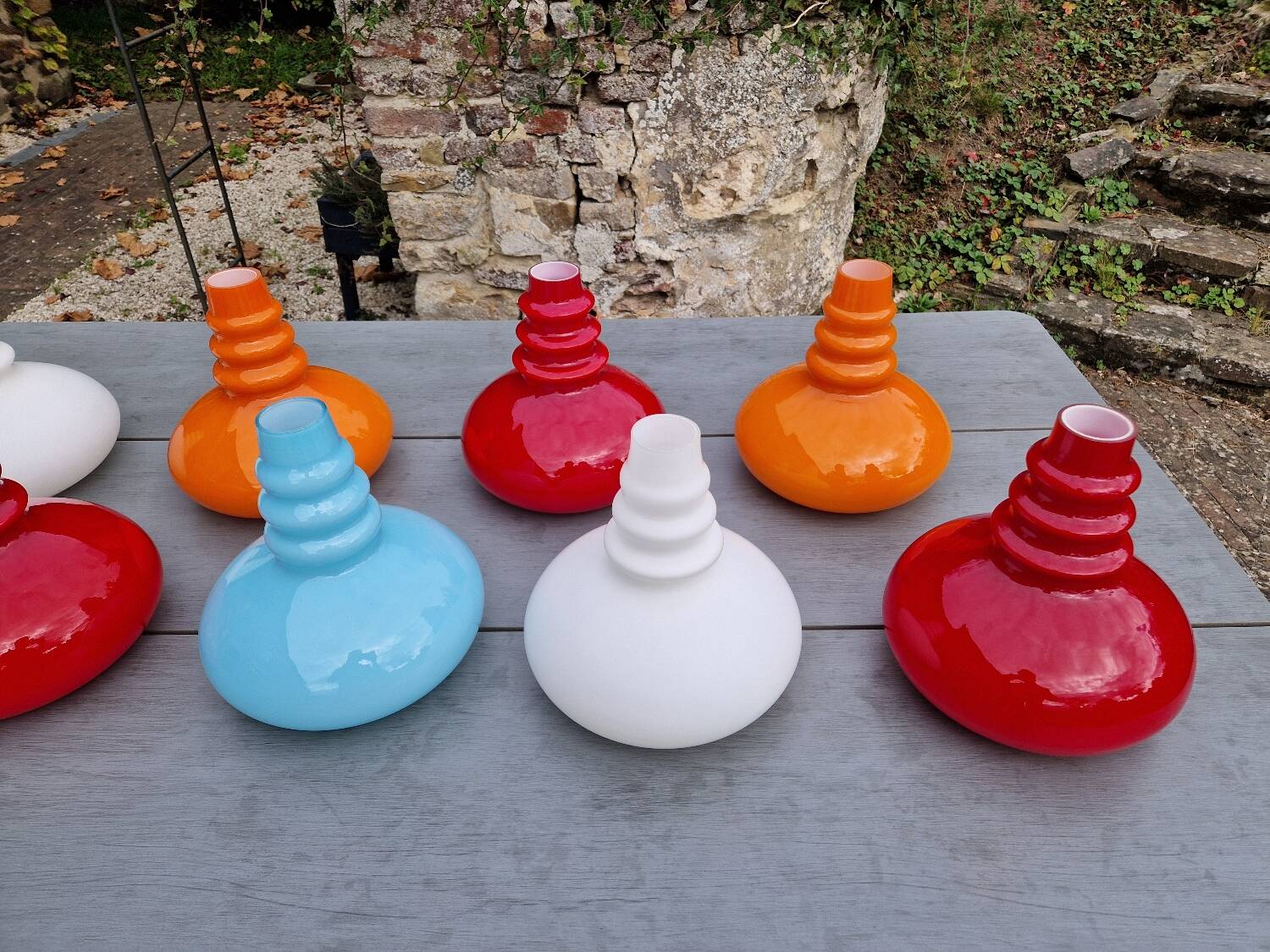 Trio of Space Age opaline pendant lights, Peill & Putzler, 1970