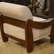 Brutalist pair of armchairs in mahogany and cream boucle 1970s.