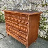 Wooden and rattan chest of drawers with woven handles