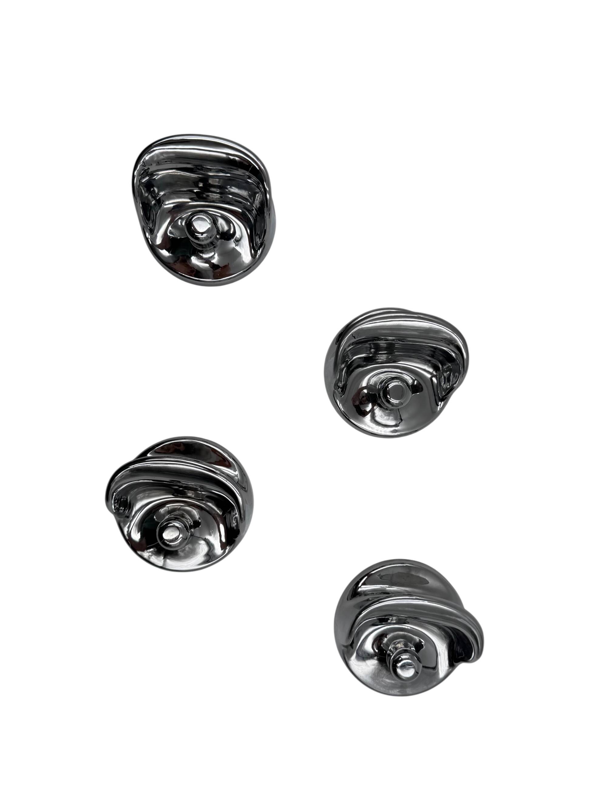 Space age set of 4 chrome plastic coat hangers, Olaf Von Bohr, Kartell Ital
