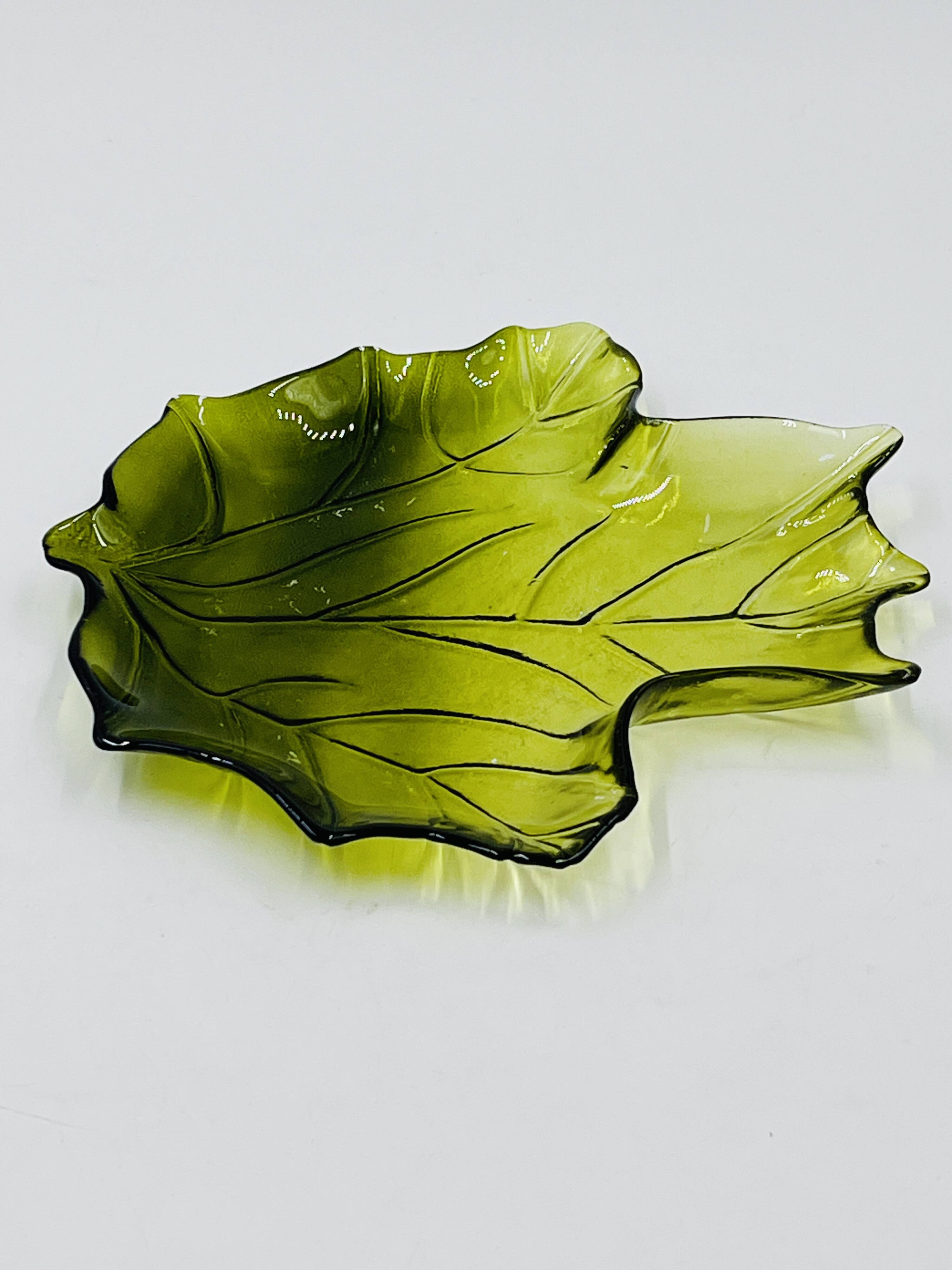 Vintage green glass leaf catchall from the 1970s.