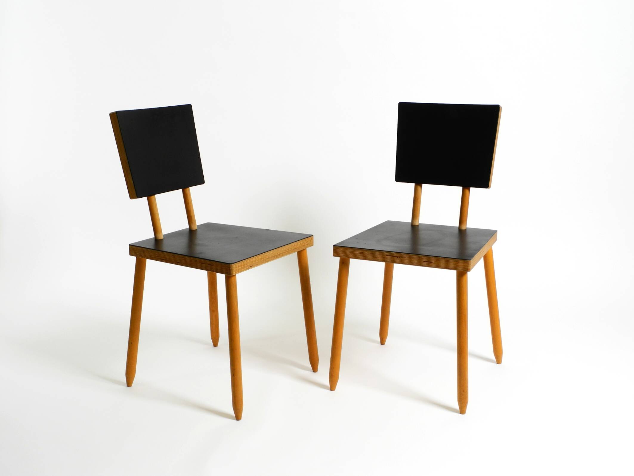 Two rare demountable plywood chairs by Axel Kufus model Stöcke for Atoll