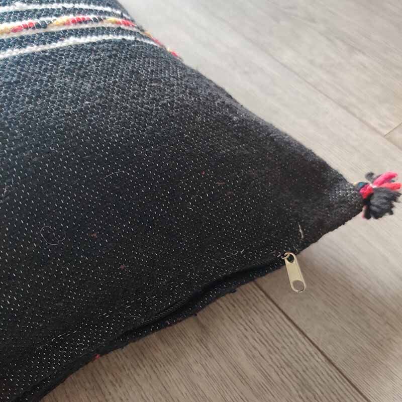 Berber-pom cushion in cotton pompom