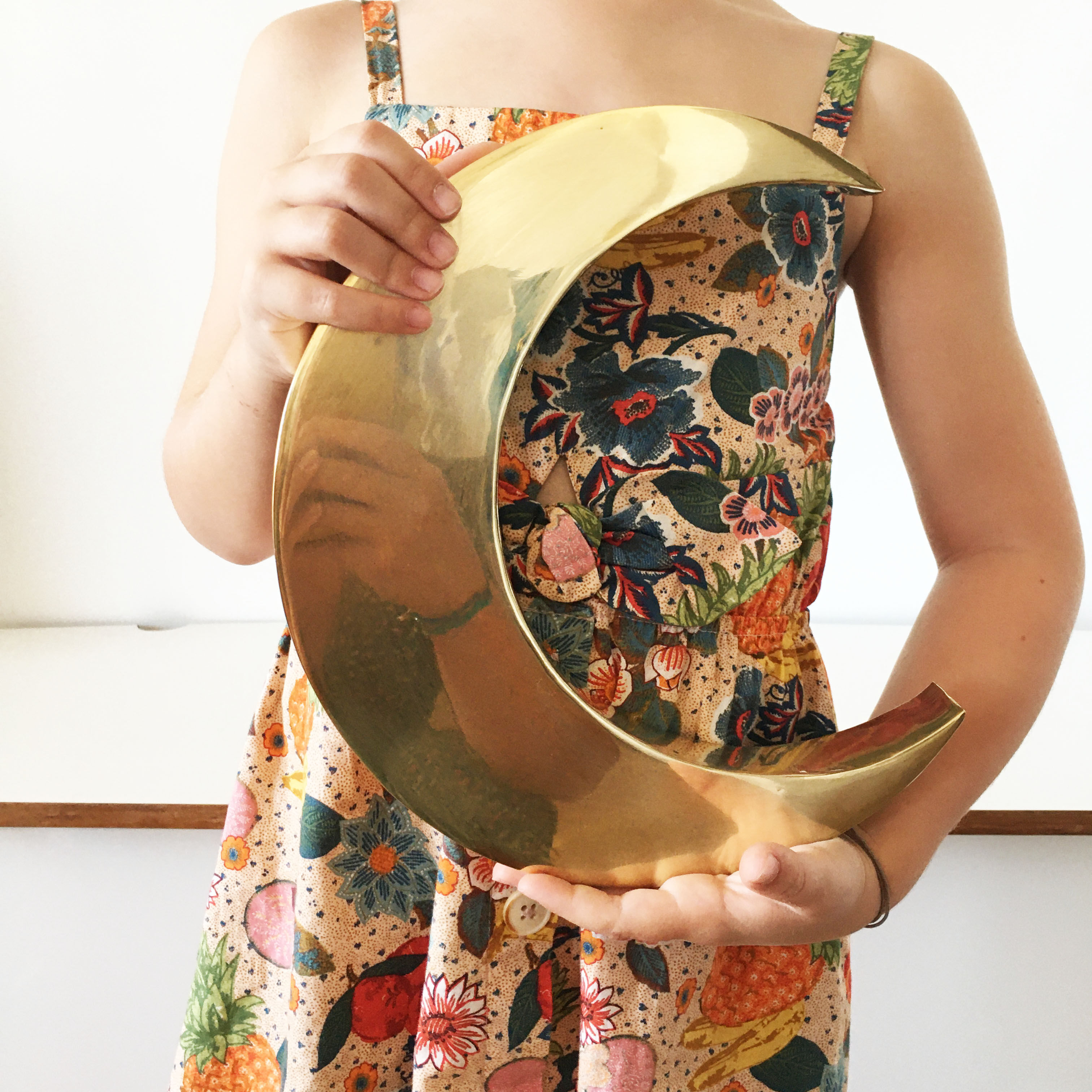 Moon or letter of sign "C" in vintage brass