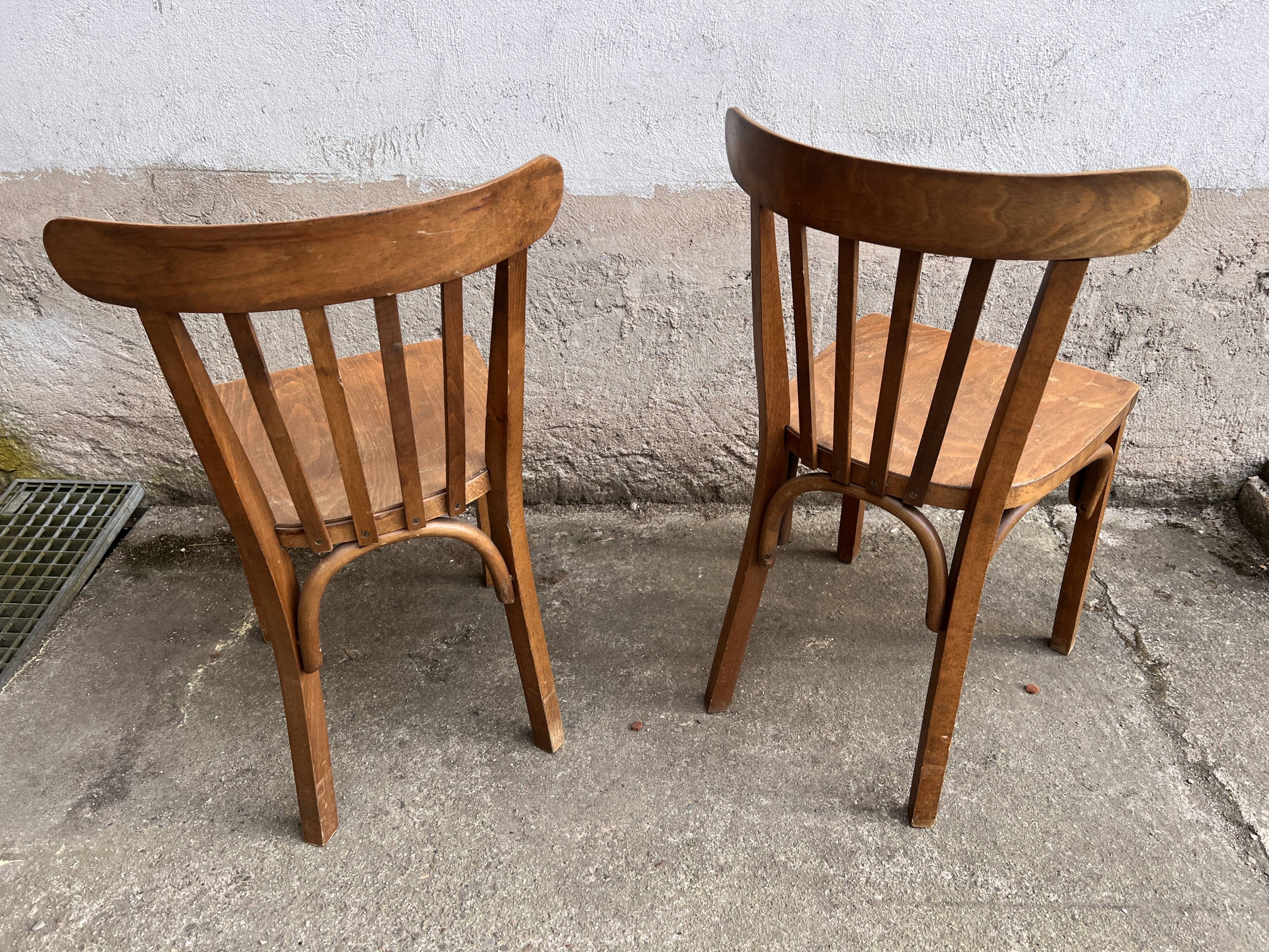 Pair of vintage wooden bistro chairs
