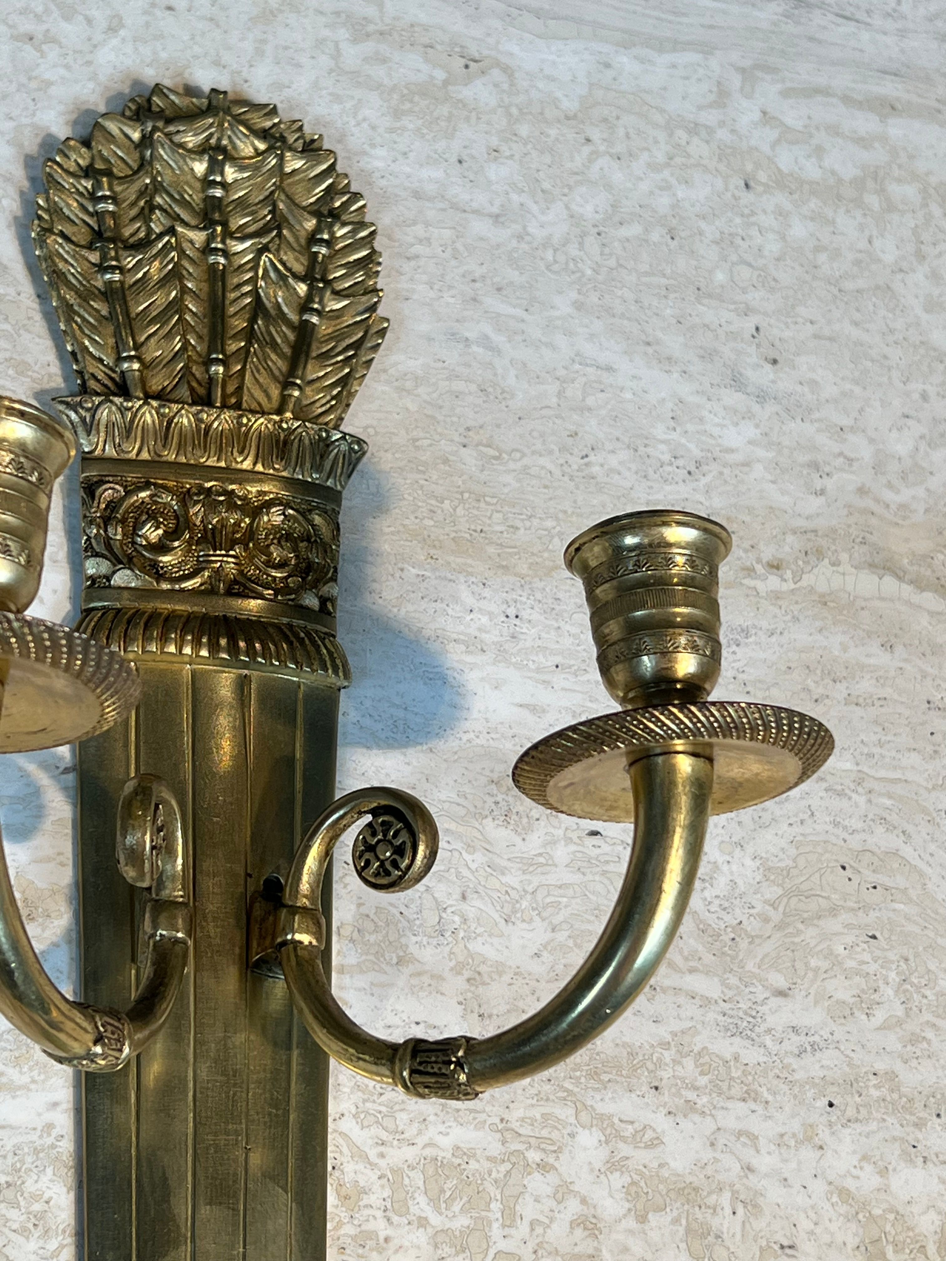 Pair of Empire style bronze wall sconces with quiver design.
