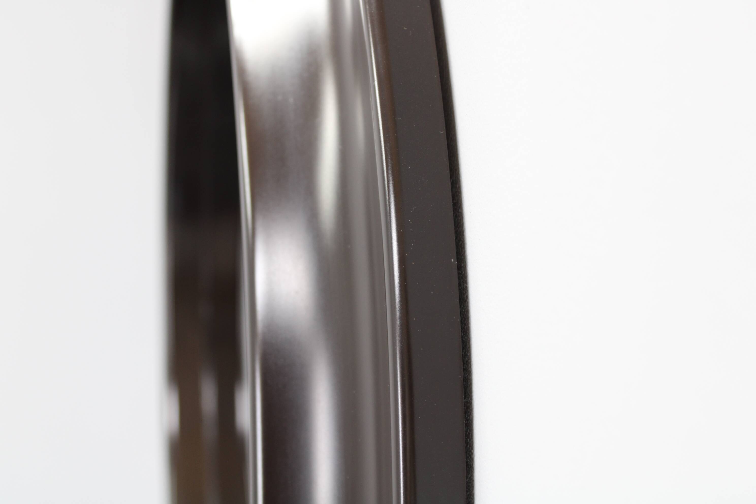 1970s Italian round mirror in dark brown plastic frame