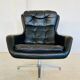 Vintage Danish swivel chair in black leather by Bramin