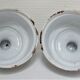 Four white enamelled metal cheese bells early twentieth century