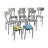 lot of 7 white formica chairs and 2 stools