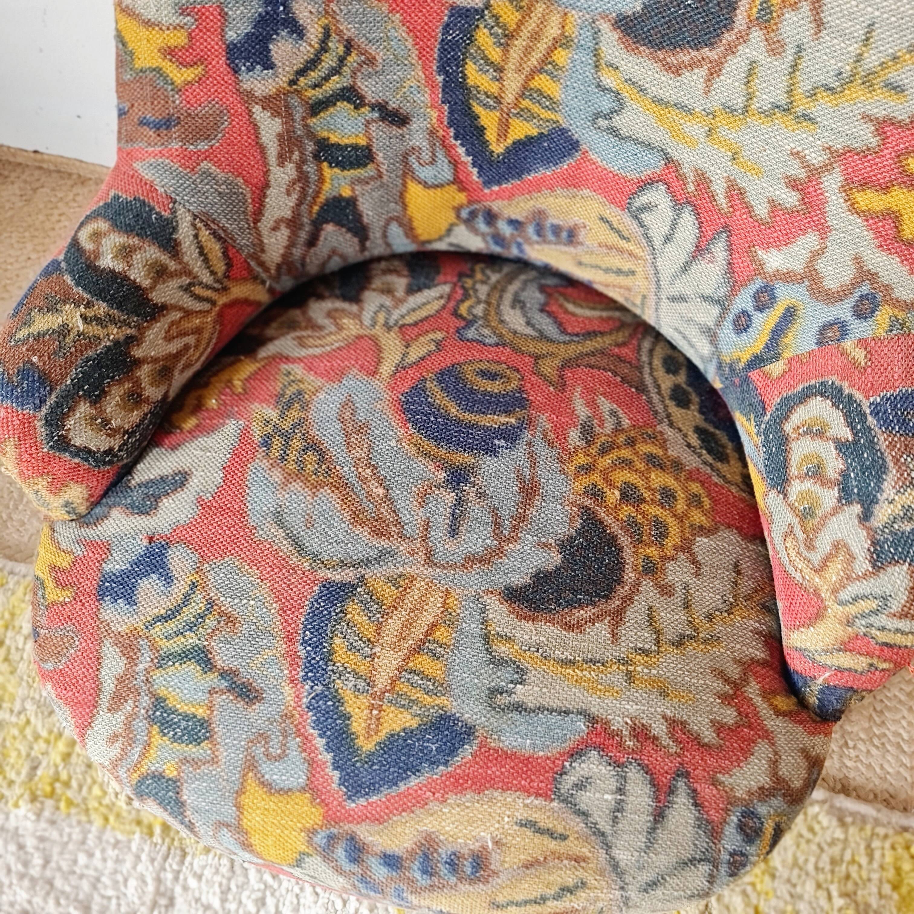 Small "madame" toad chair, vintage, upholstered in multicoloured floral fabric.