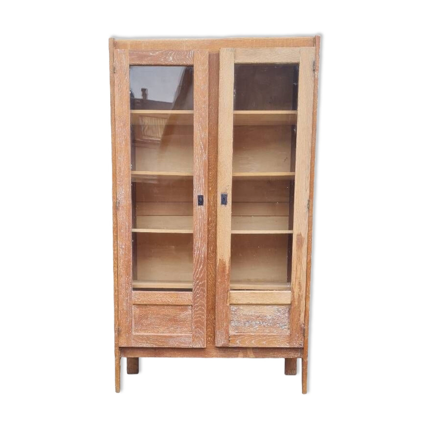 Armoire pied compas en chêne blond