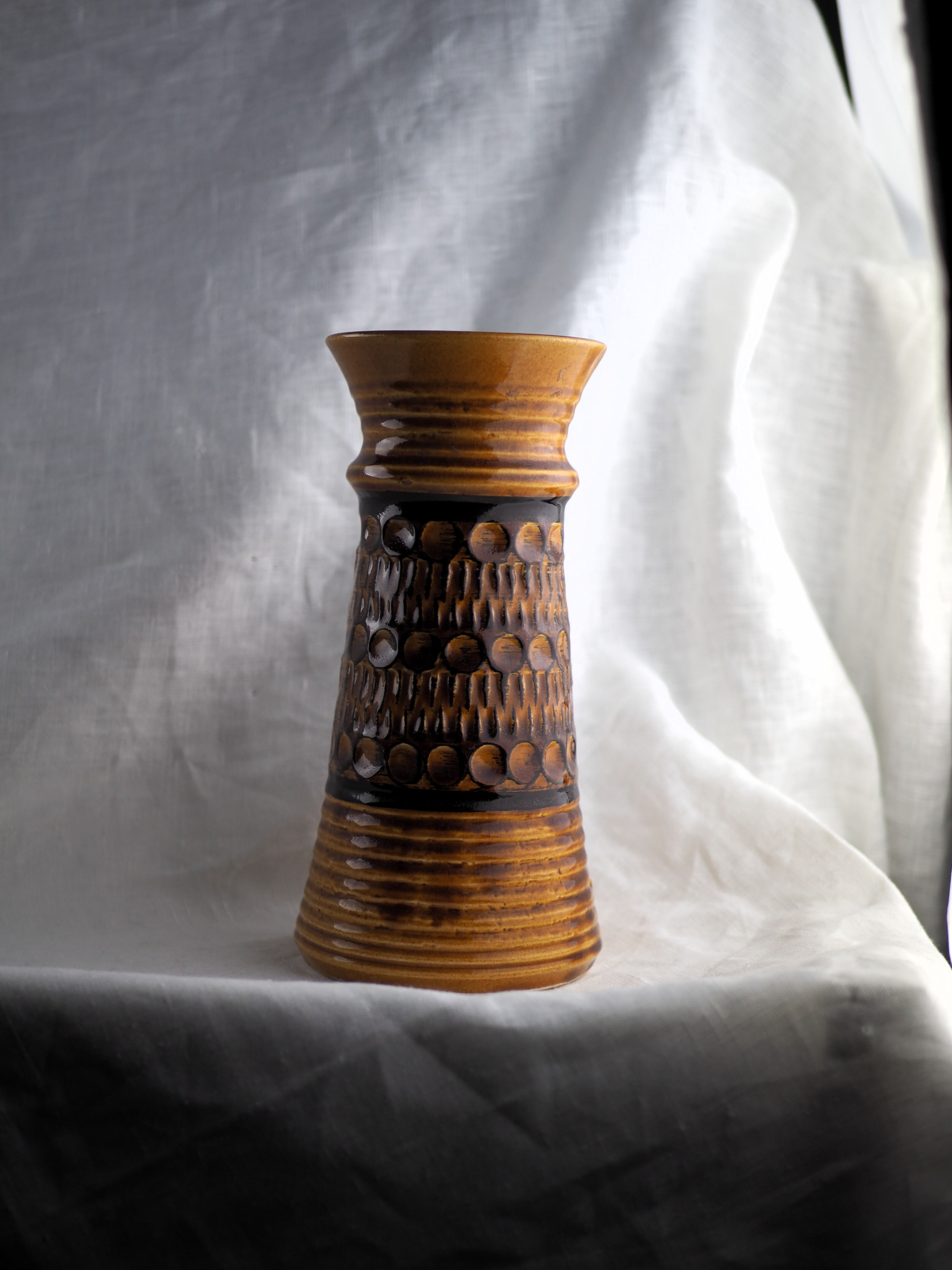 High arched vase, round hollow patterns and spikes, black and ocher seventies vibe - Bay Keramik - 70'