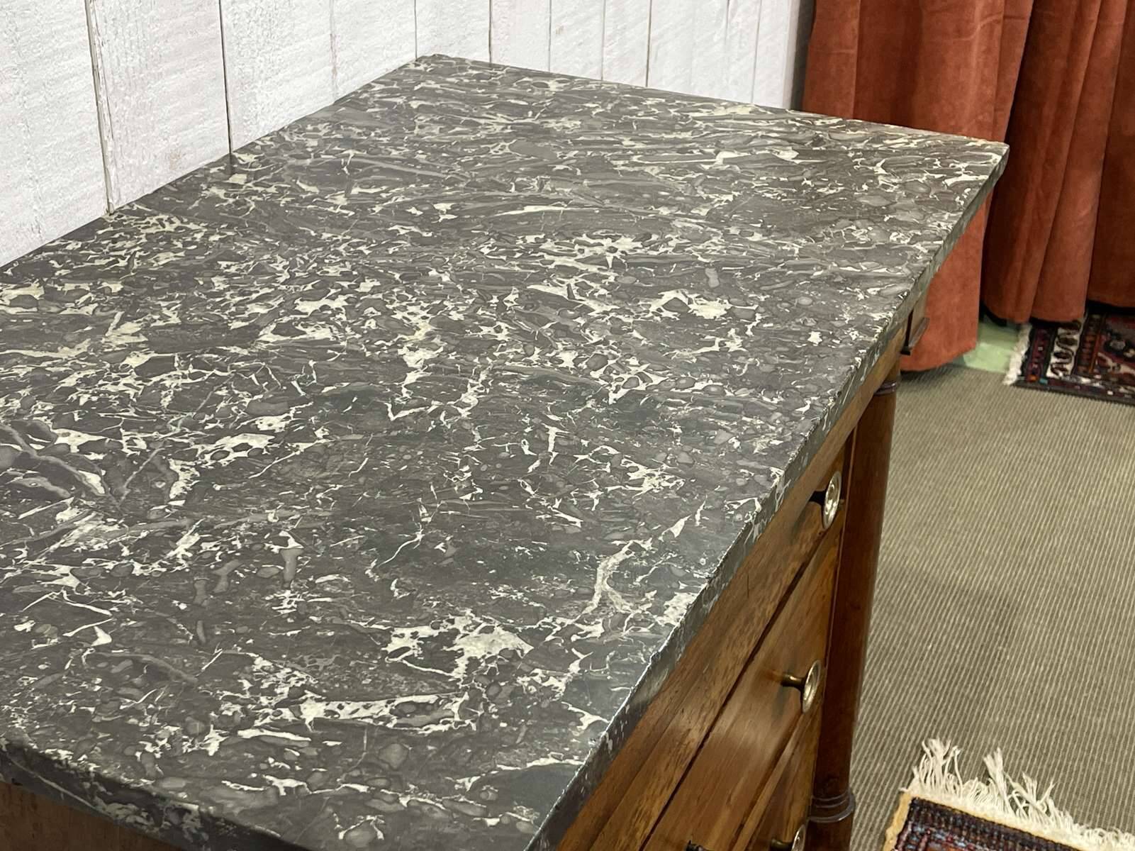 19th-century Empire commode in walnut with a grey St Anne marble top.