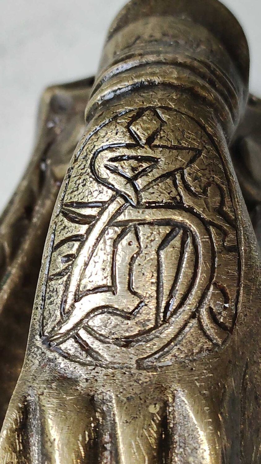 Door knocker in bronze