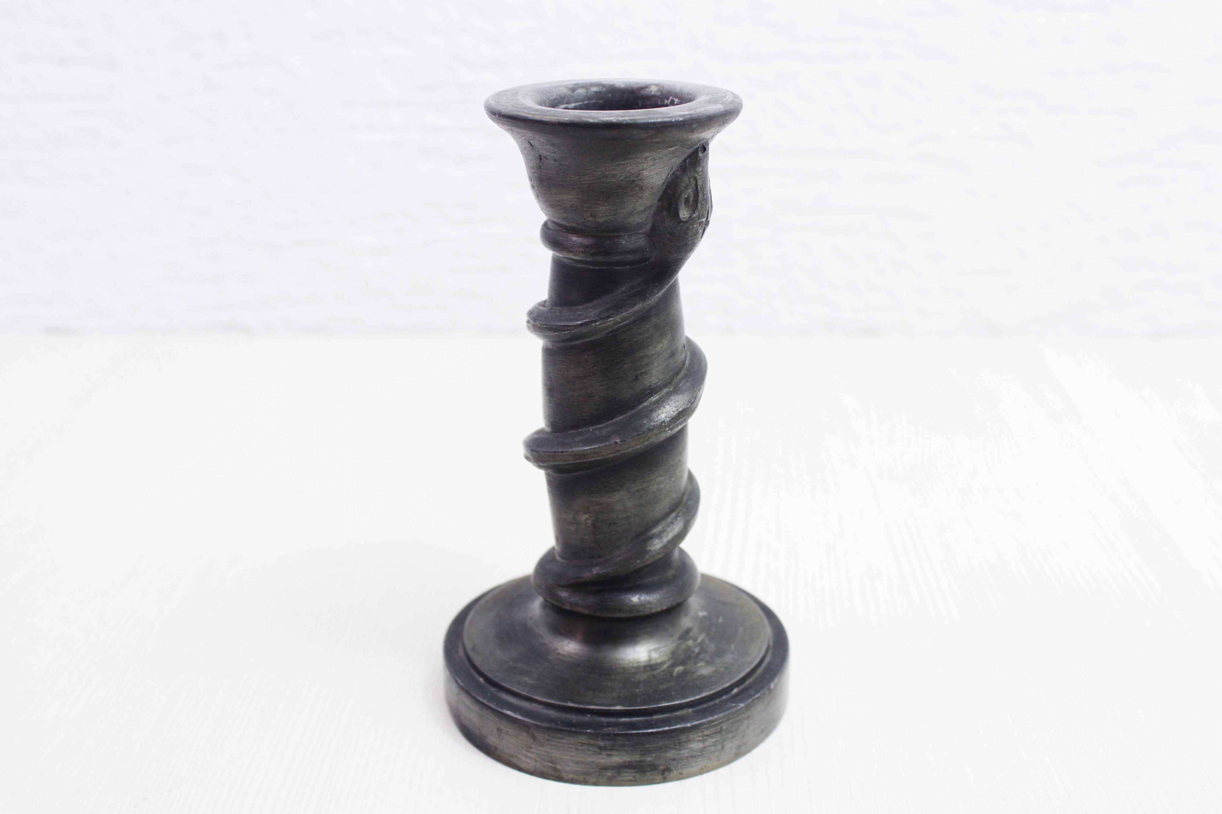 Serpent candlestick in pewter, early 20th century.