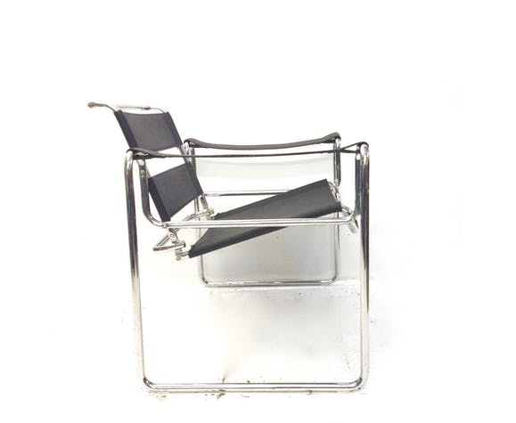 Fauteuil tubulaire et cuir noir