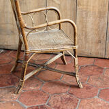 Asymmetrical rattan armchair
