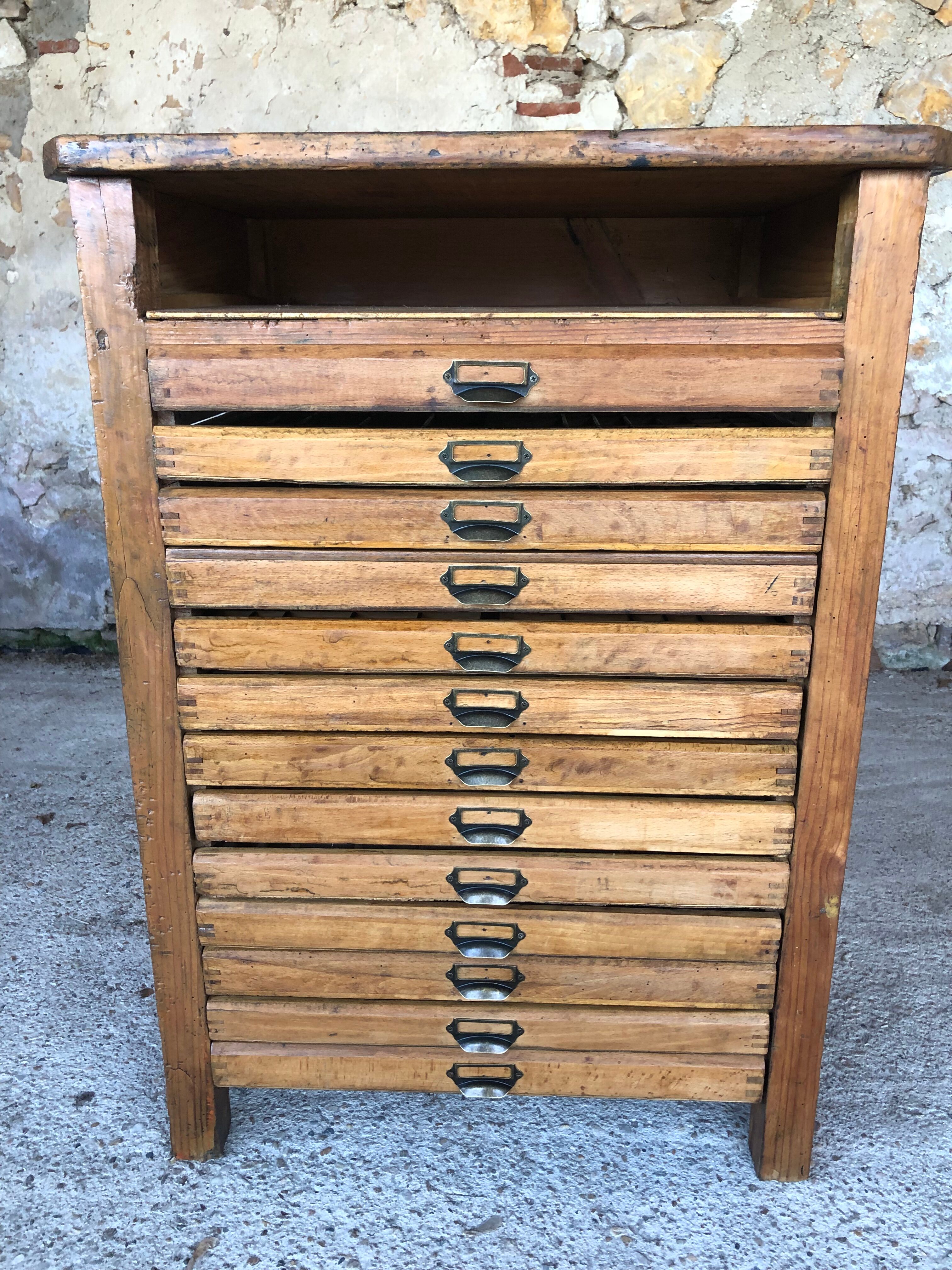 Oak craft cabinet has 13 drawers circa 40's / 50's