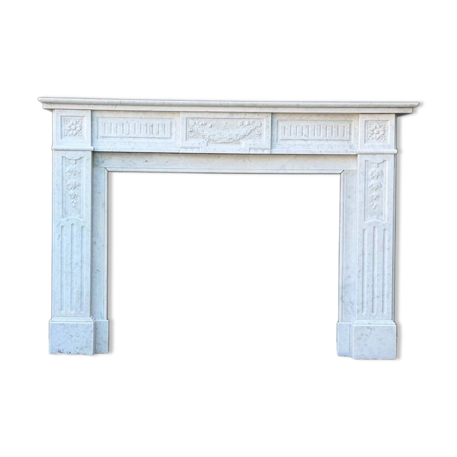 Louis XVI style fireplace in white Carrara marble, circa 1880.