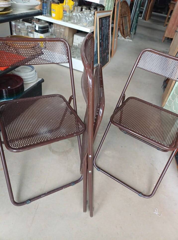 vintage perforated metal folding chair –