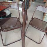 vintage perforated metal folding chair –