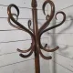 Curved antique wooden parrot