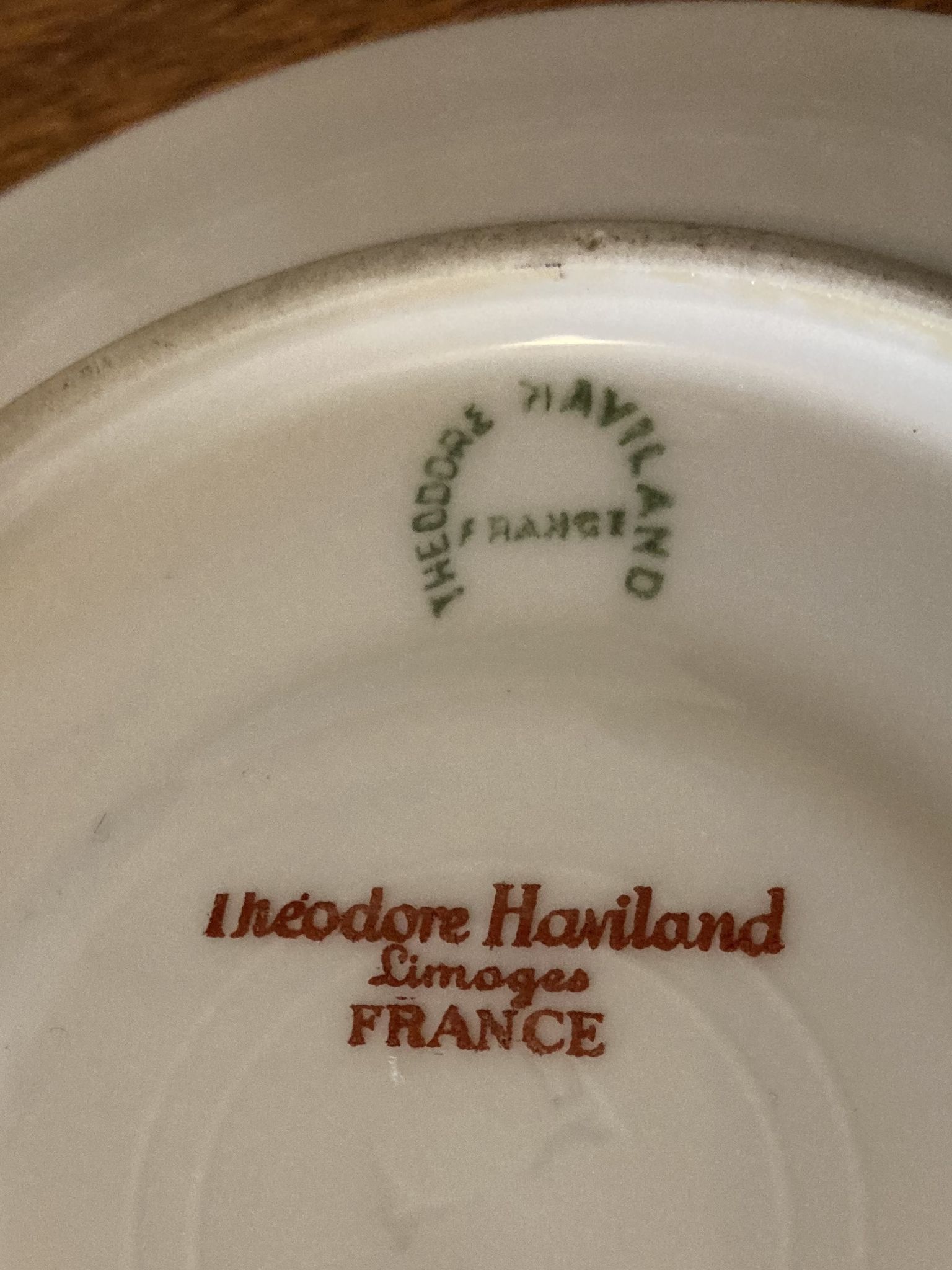 9 Limoges Haviland porcelain saucers or saucers with floral motifs.