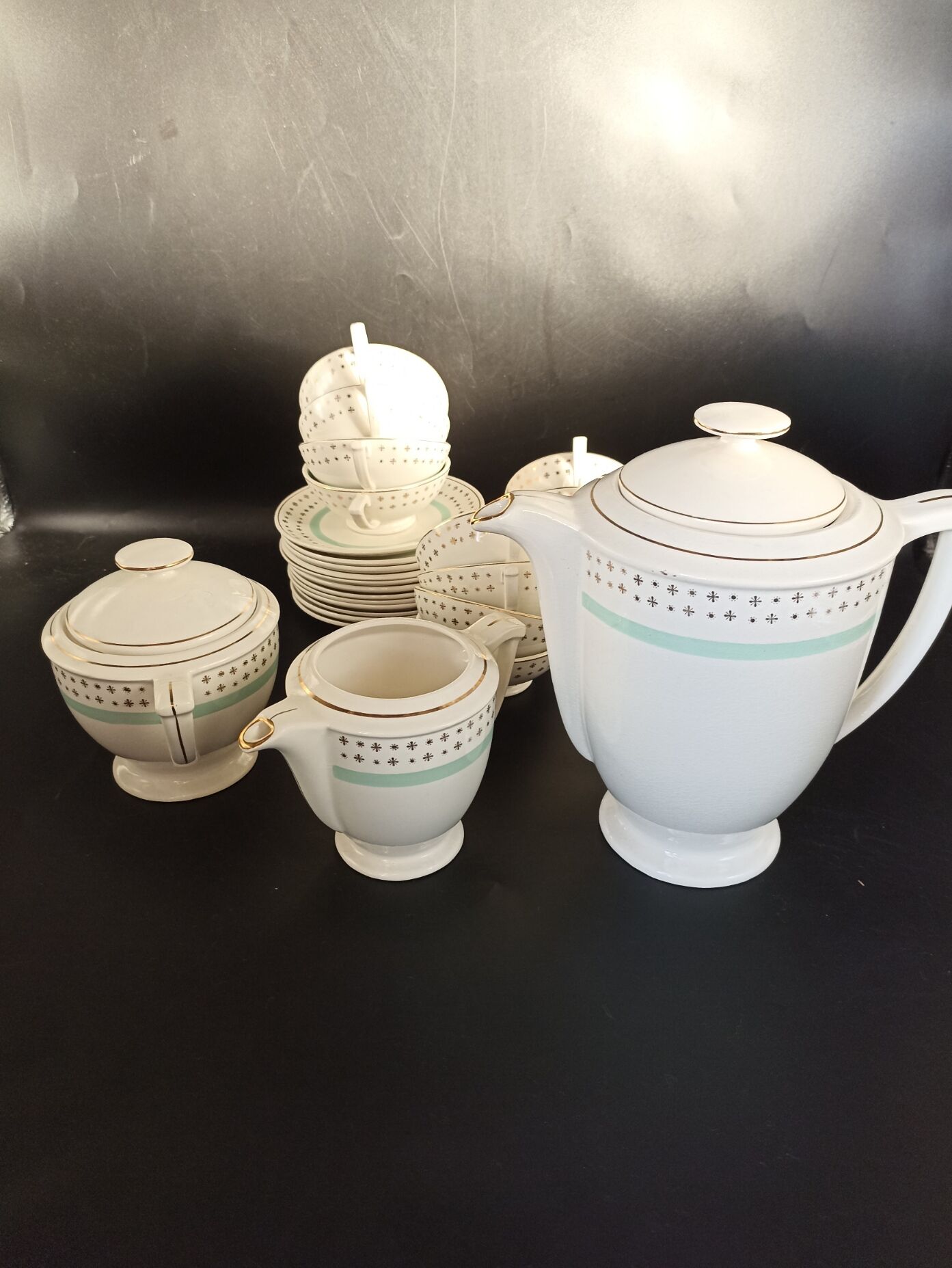Tea set stars and mint green in semi-porcelain