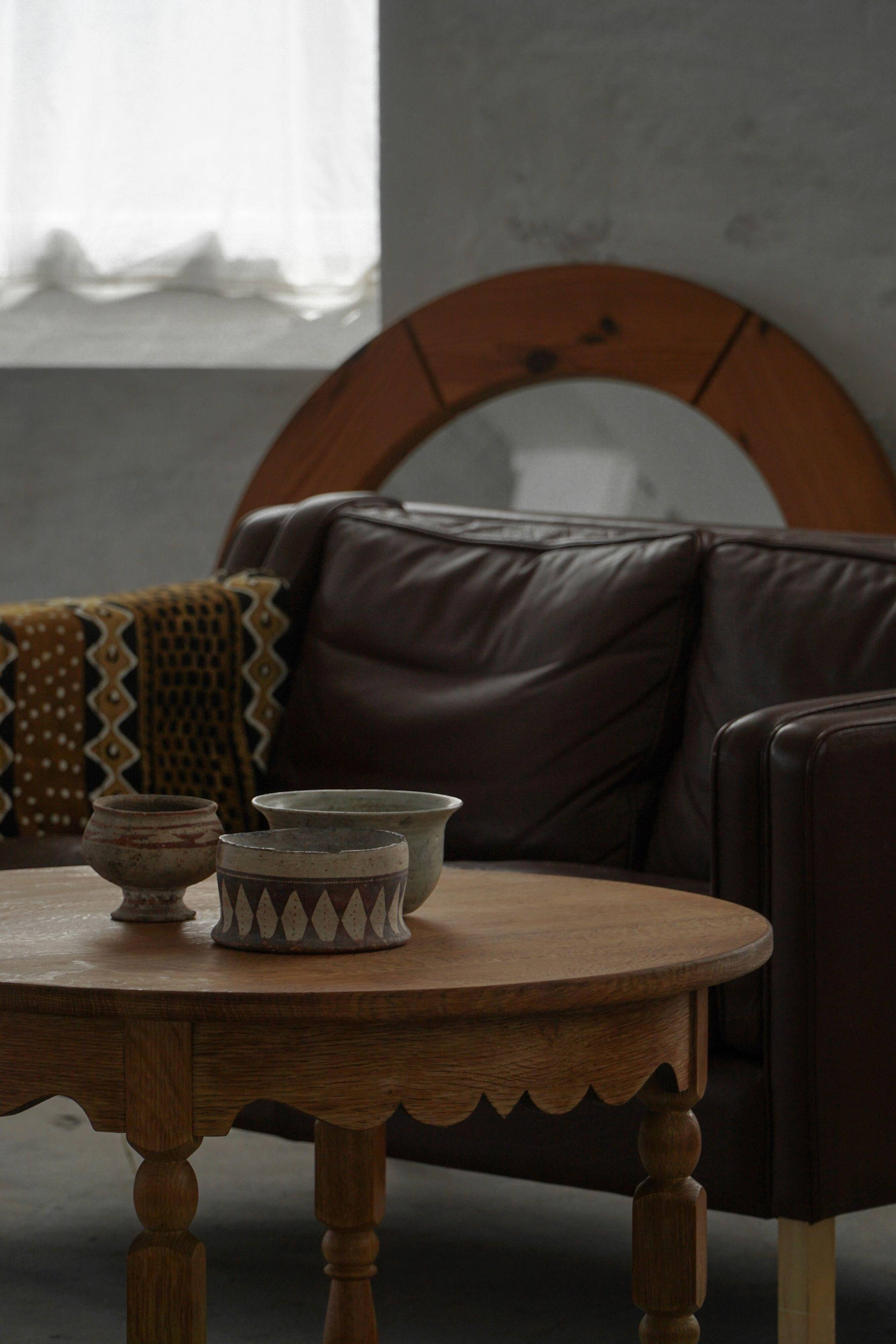 Mid-century Danish round side table in solid oak, Henning Kjærnulf, 1960s.