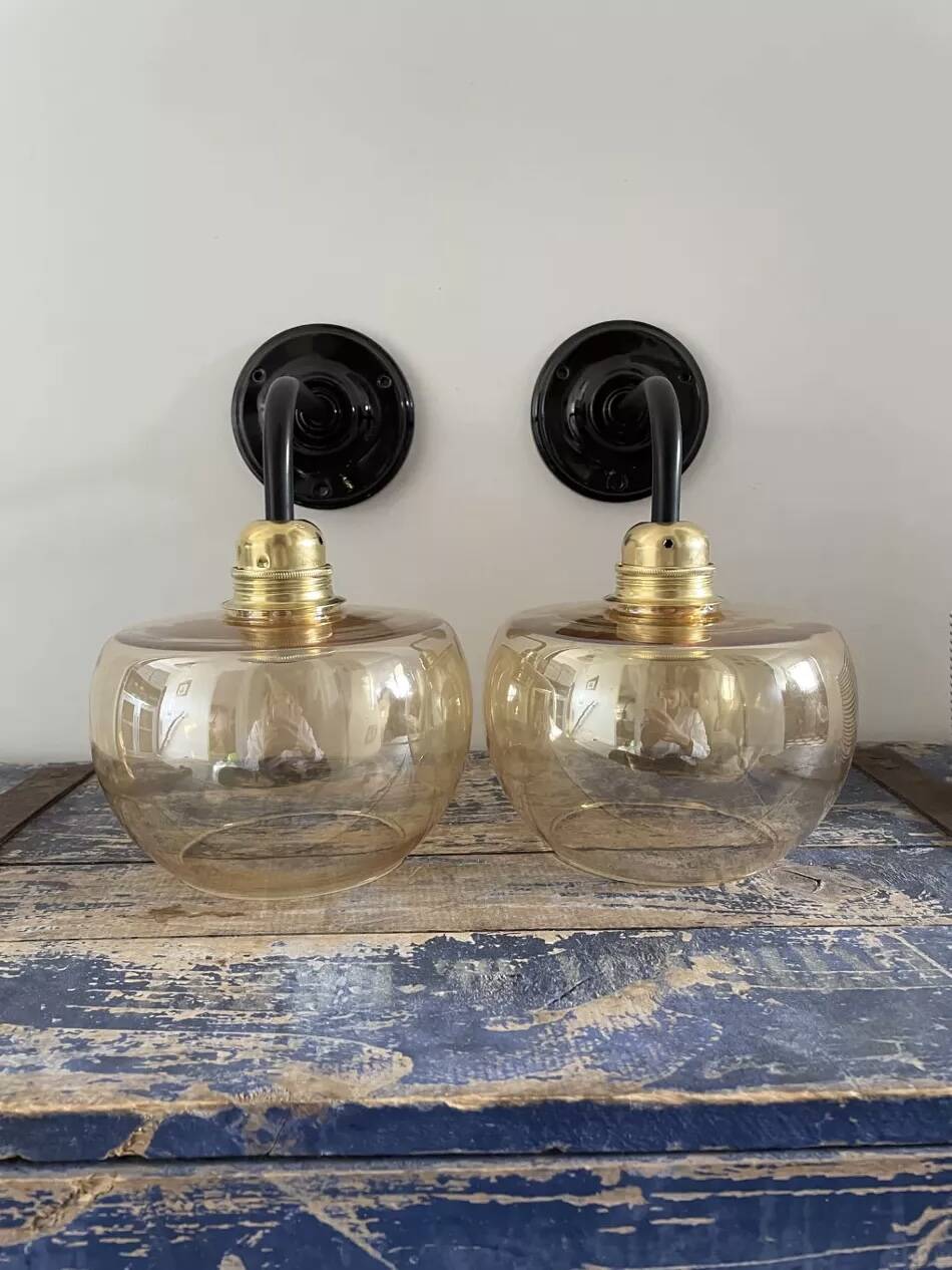 Pair of gold globe wall sconces