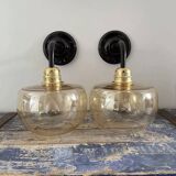 Pair of gold globe wall sconces