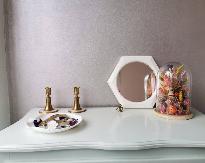 White ceramic dish shaped like 80s shells