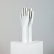 Pair of authentic vintage jewellery displays in industrial porcelain representing hands.
