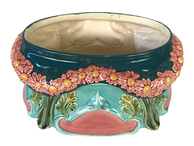 Polychrome slip planter decorated with flower garland