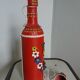 Bottle bottle leather dressing and its shot glass