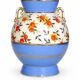 Art Deco round vase by Boch Frères Keramis, red flowers and blue bands.