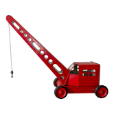 Red sheet metal construction crane dating from the 60s with manual mechanism
