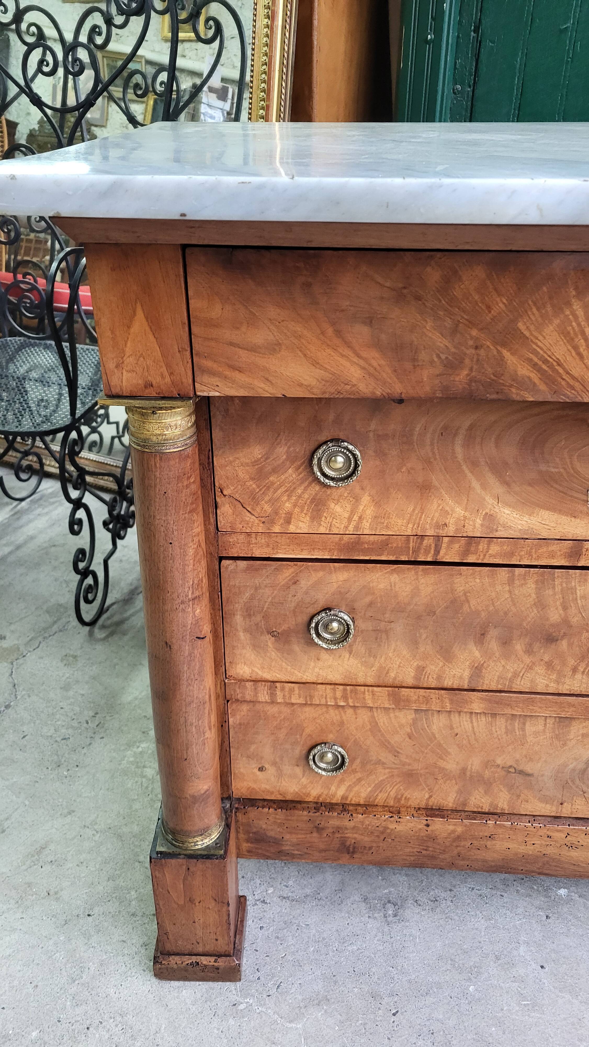 Empire commode in walnut with white marble top from the 19th century